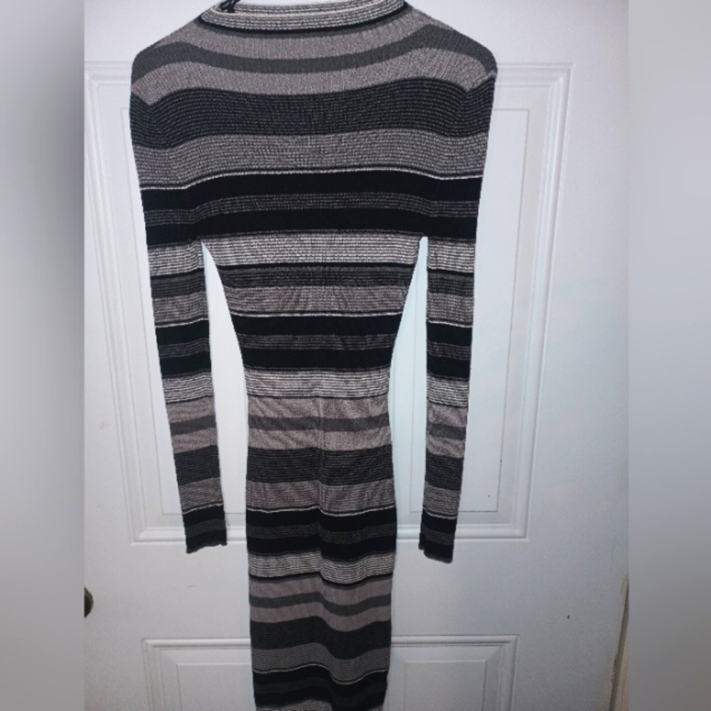 A woman's Derek Hart dress size medium. Striped black and gray